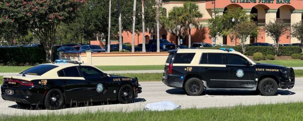 Several Florida Highway Patrol squad cars were on the scene of the pedestrian fatality