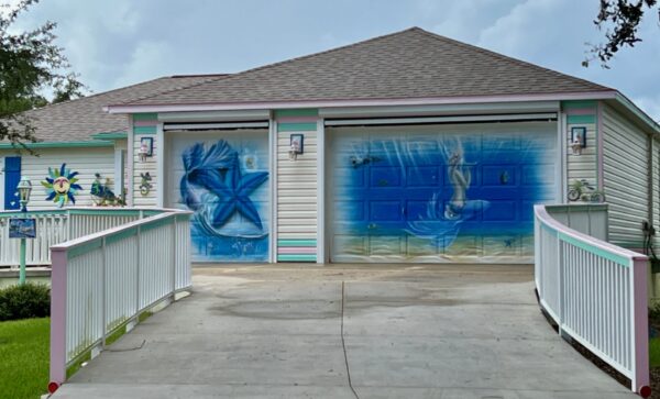 The murals painted on this home will be the subject of a public hearing at Savannah Center