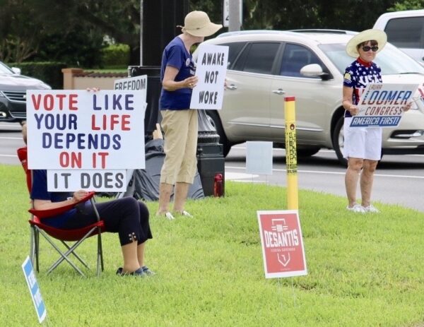 Viillagers for Trump participated in a sign waving event Friday in The Villages