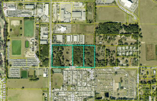 The green lines show where the apartment complex would be built on Rolling Acres Road across from The Villages Woodshop