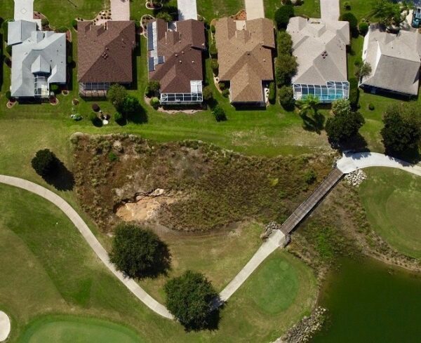 Villagers living on the Lopez Legacy Golf Course are worried about an expanding sinkhole