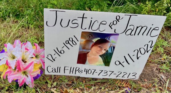 A sign on Rolling Acres Road is calling for 22Justice for Jamie.22