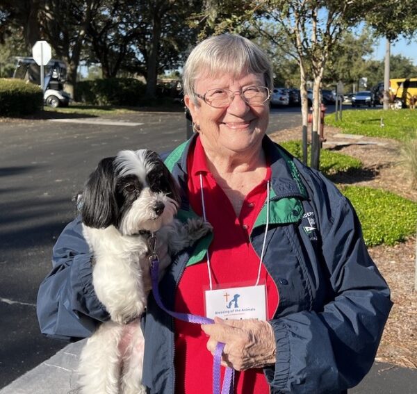 Church volunteer Lynn Voelkle with nine year old Brandy helped put on the Bessing of The animals service