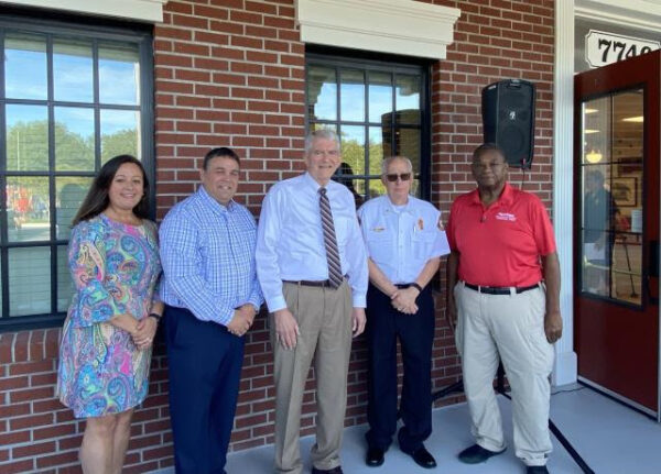 Congressman Daniel Webster center with officials from The Villages District Government