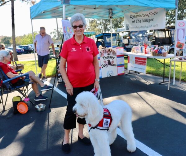 Finnegan a servicedog with Sara Morgan are members of the Dynamic Dog Club Of the Villages