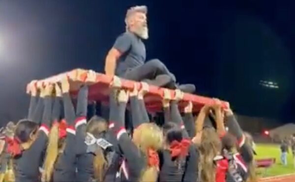 Jason Patrick Sager posted a video of himself being held up on a platform by cheerleaders at South Sumter High School