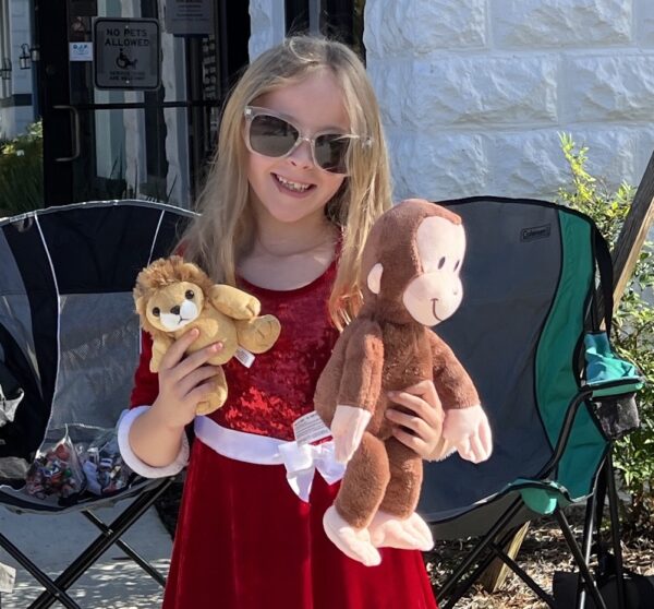 Avalyn Whipple collected lots of candy and two stuffed animals from the parade floats Avalyn Whipple collected lots of candy and two stuffed animals from the parade floats