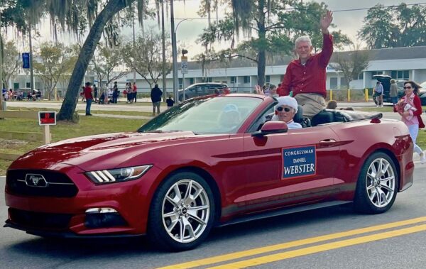 Congressman Daniel Webster rode through the parade in a convertible 1