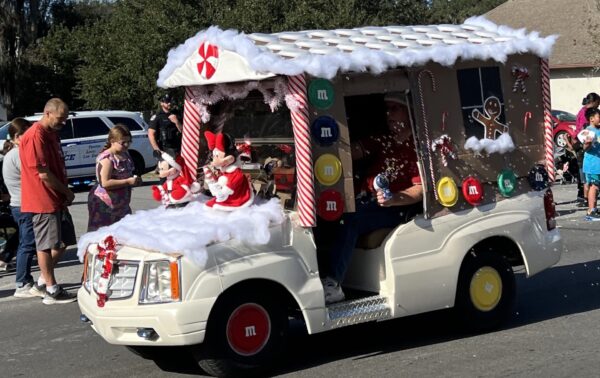Dozens of decorated golf carts filled the route dispensing candy to all the kids. Dozens of decorated golf carts filled the route dispensing candy to all the kids.