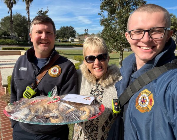 Members of Temple Shalom took treats to first responders on Christmas Day