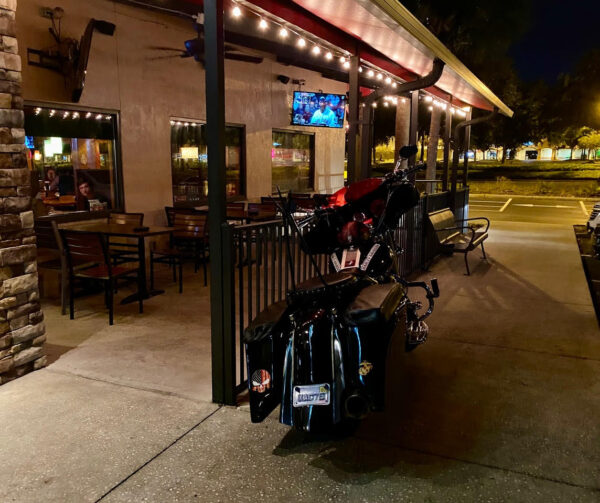 Motorcycle on sidewalk at Applebees