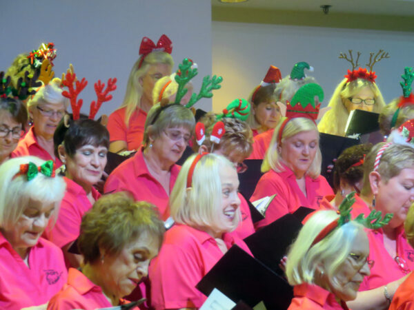 The Villages Pops Chorus dressed for the holidays during the concent on Monday