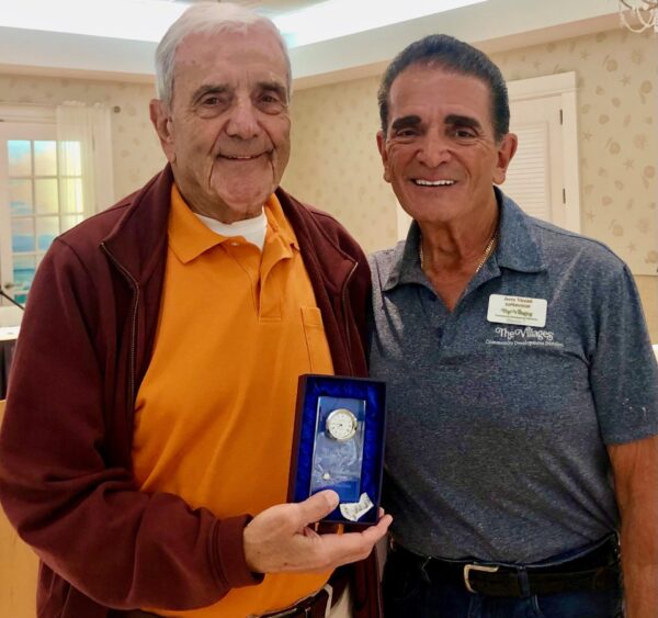 William Von Dohlen was presented with a clock by Community Development District 7 Board Chairman Jerry Vicenti William Von Dohlen was presented with a clock by Community Development District 7 Board Chairman Jerry Vicenti