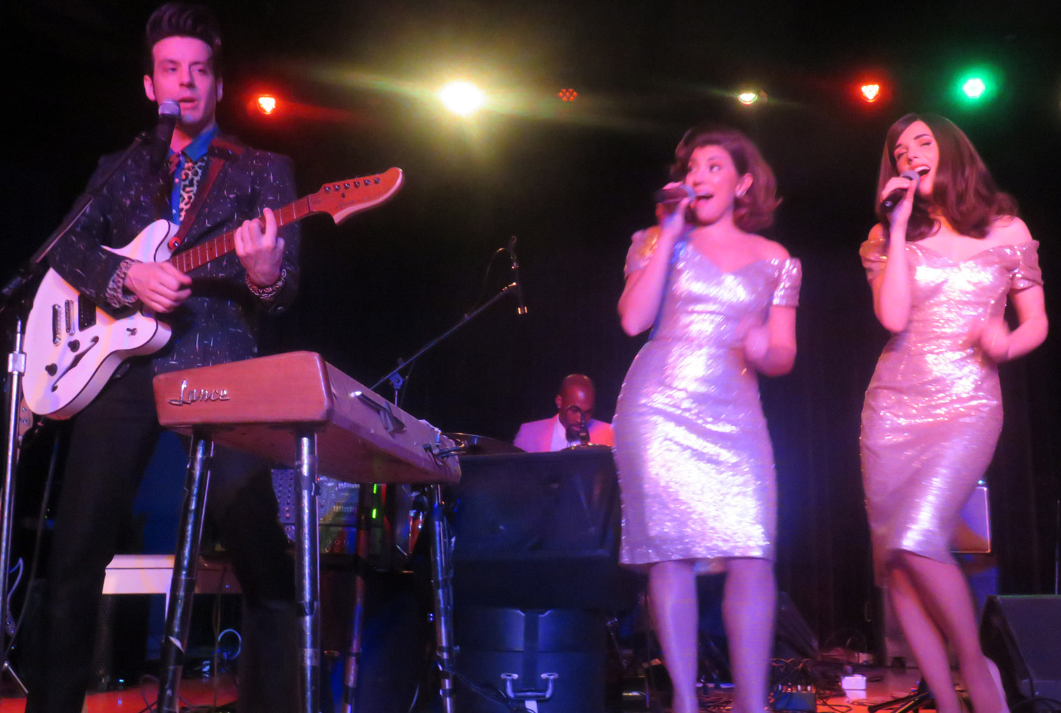 Lance Lipinsky along with Darcy Jo Wood center and Molly Jean Denninghoff team on a roots number