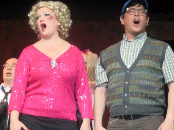 Pinky Bigley as Audrey and March Kirschenbaum as Seymour get together in Little Shop of Horrors in Savannah Center