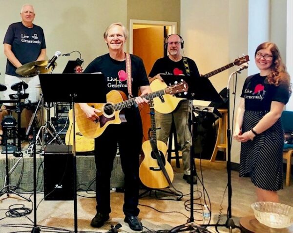 Amazing Grace Lutheran Churchs praise team includes Jeff Robinson Pastor Bruce Lamont Steve Rockey and Elizabeth Rockey from left Amazing Grace Lutheran Churchs praise team includes Jeff Robinson Pastor Bruce Lamont Steve Rockey and Elizabeth Rockey from left