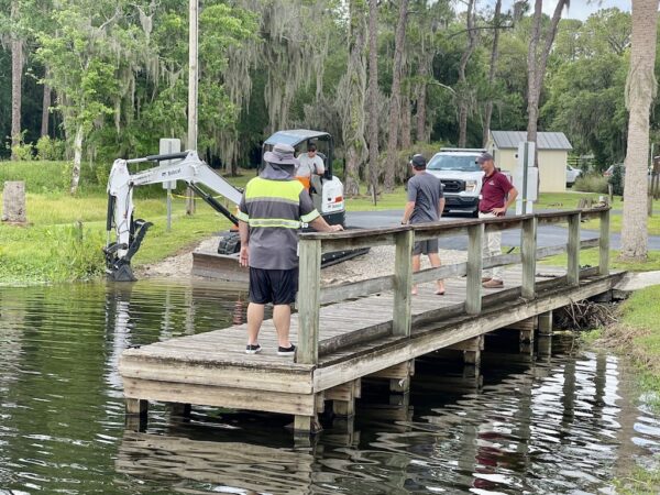 A crew was working Tuesday morning at the Lake Deaton Park boat ramp