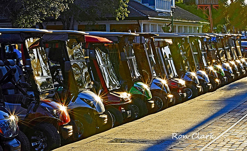 Golf carts reflect setting sun in The Villages