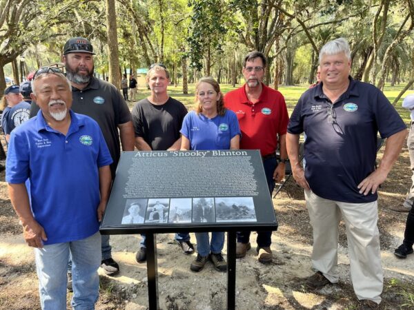 Town employees, including Parks and Recreation Director Mike Burske, far right, stand by the marker explaining the namesake of Snooky Park Town employees, including Parks and Recreation Director Mike Burske, far right, stand by the marker explaining the namesake of Snooky Park