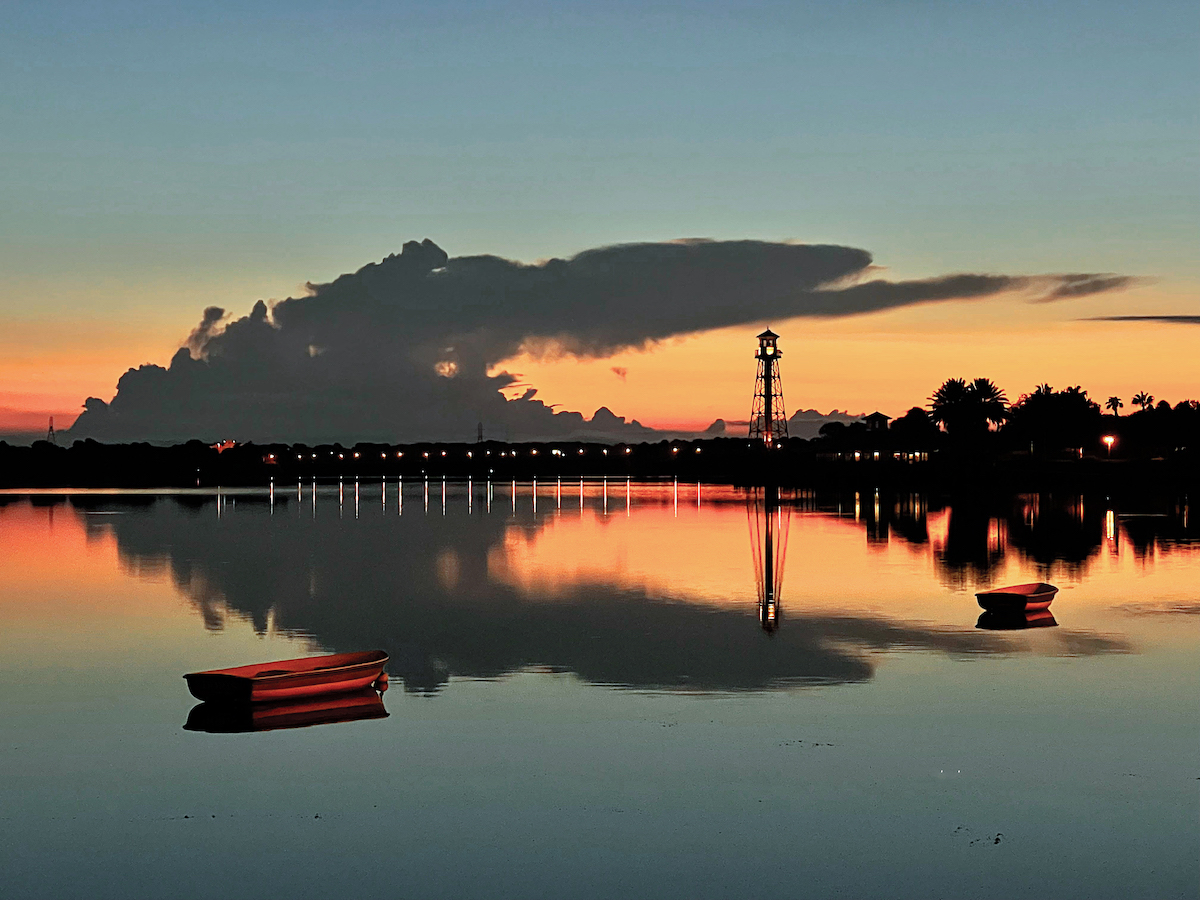 Beautiful sunset behind lighthouse at Lake Sumter