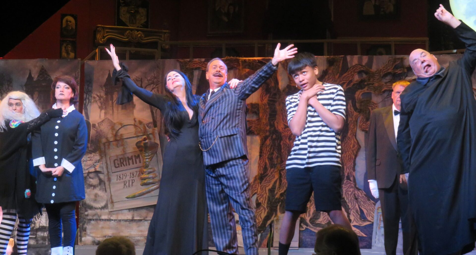 Deborah Gibbons and Tim Casey center star in The Addams Family Musical at Savannah Center through Thursday