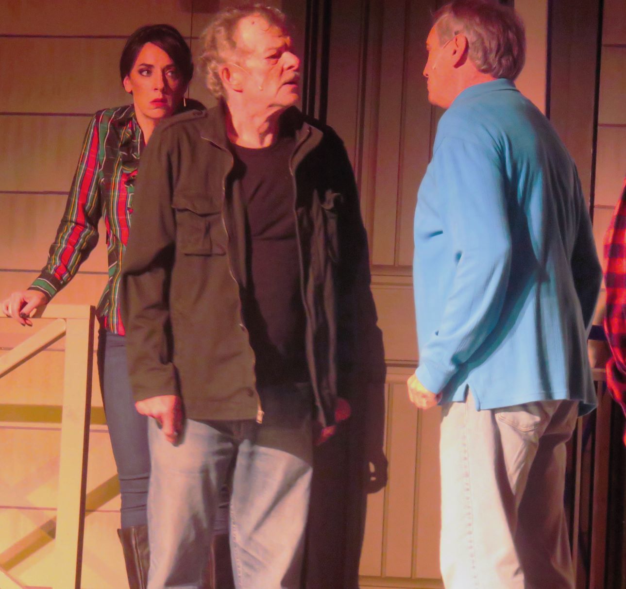 Lon Abrams, center, and Alex Santoriello faceoff as Dawn DiNome looks on