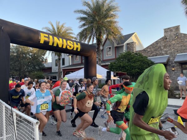 Many of the runners in the race were wearing costumes Many of the runners in the race were wearing costumes