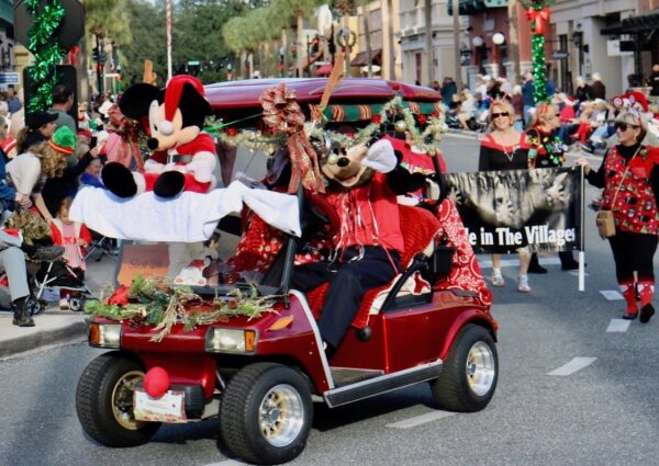 Mickey drove his cart to the Christmas parade