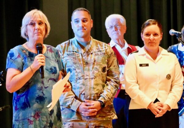 Nadine Landis, left, and Sam Landis, in back, organized the event which featured opportunities to dance with Staff Sergeant Jason Rogers Sergeant First Class Laura Mboup