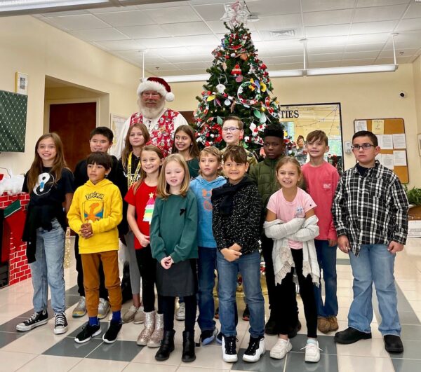 Students from The Villages Elementary of Lady Lake kept up the tradition of decorating the Christmas tree at Town Hall