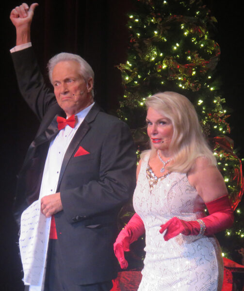 Mollie McCarthy and Frank Olive work their Christmas list during the song Santa Baby Mollie McCarthy and Frank Olive work their Christmas list during the song Santa Baby