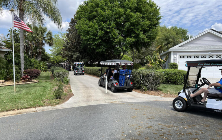 A Village of Winifred resident has counted up to 1,800 golf carts per day using a cut through near his home.