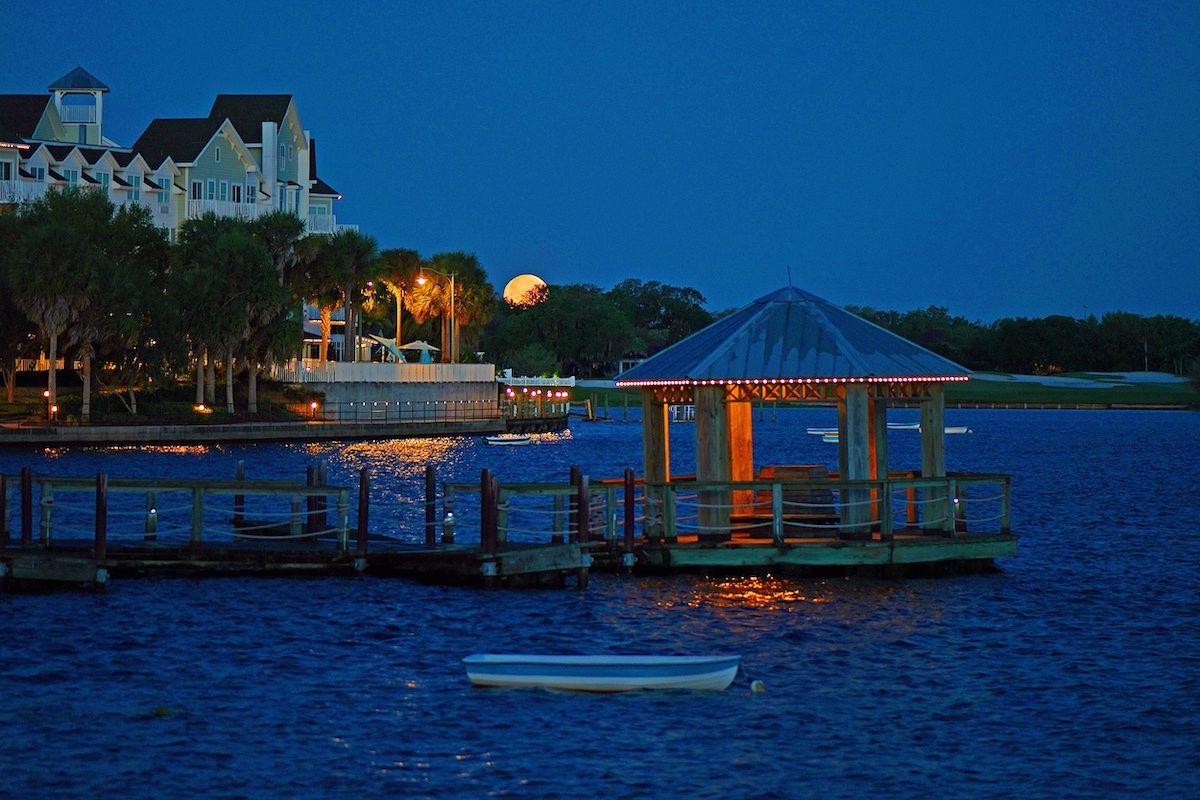 Full moon setting over Lake Sumter in the early morning