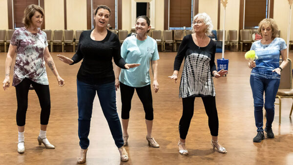 Mary Jo Vitale second from left rehearses dance steps. (Dave Boege photo)