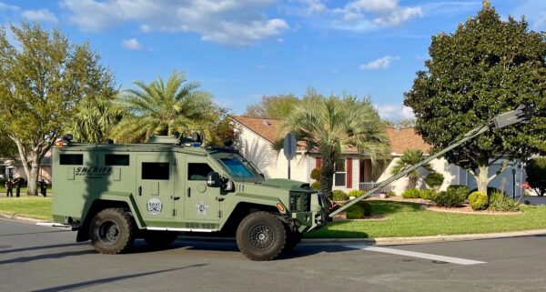 The SWAT team brought in an armored personnel carrier The SWAT team brought in an armored personnel carrier
