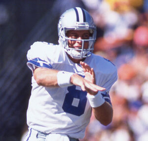 Troy Aikman was the quarterback of the Dallas Cowboys when he dated Lorrie Morgan