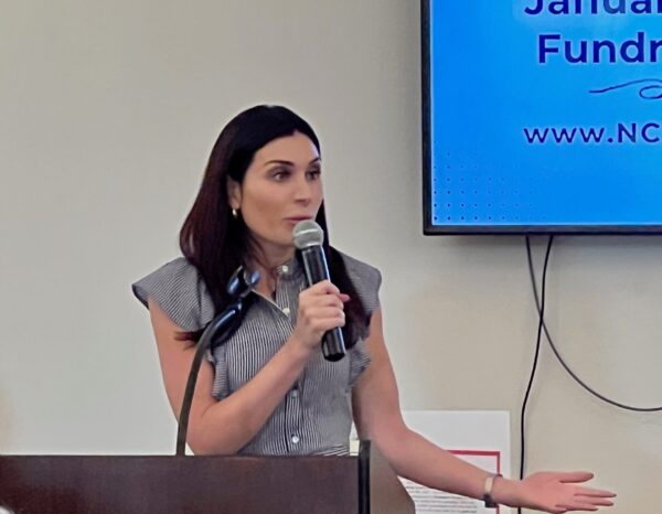 Laura Loomer addressed the audience and said she had dedicated herself to raise funds for Jauary 6 defendants . She said she has raised over $250,000 Laura Loomer addressed the audience and said she had dedicated herself to raise funds for Jauary 6 defendants . She said she has raised over $250,000
