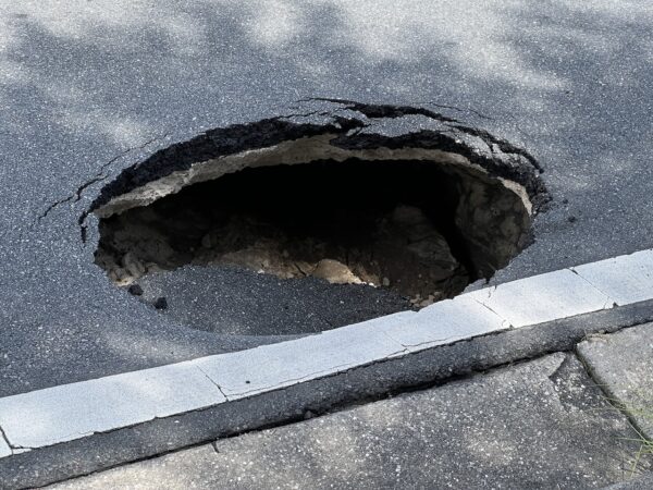 A sinkhole opened up Tuesday on Morse Boulevard near Lake Sumter Landing A sinkhole opened up Tuesday on Morse Boulevard near Lake Sumter Landing
