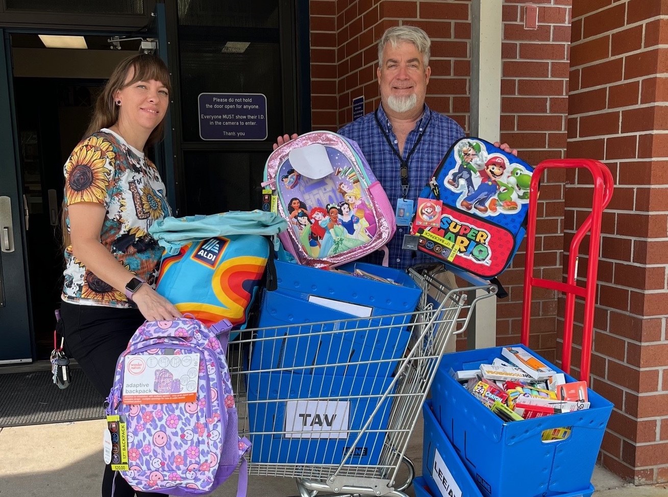 Lady Lake Library Youth Services Assistant Kourtney Fehr and The Villages Elementary of Lady Lake Principal Gregg Dudley.