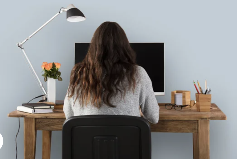 woman sitting at computer