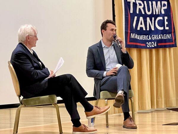 Charlie Kirk, right, appeard on stage with Tommy Jamieson Charlie Kirk, right, appeard on stage with Tommy Jamieson