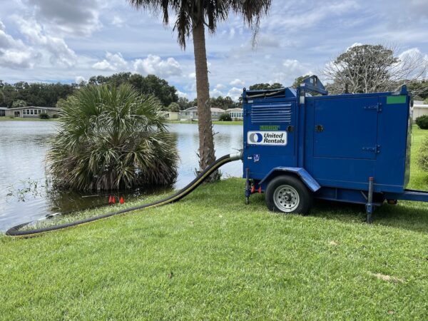 Pump moving water out of lake to sewer system Pump moving water out of lake to sewer system
