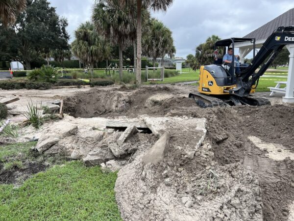 The water main break was near the shuffle board courts and the picnic shelter The water main break was near the shuffle board courts and the picnic shelter.