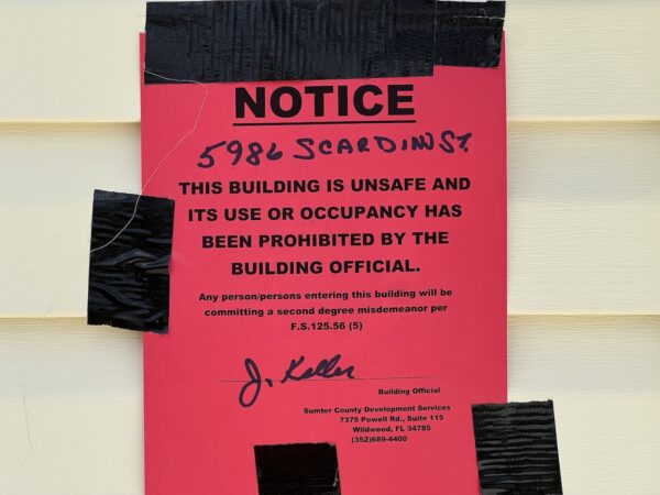 This notice has been posted on the home at 5986 Scardino St. in the Glenda Villas