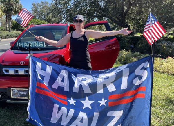 Paula Orlando proudly waves her American flag Thursday afternoon on Morse Blvd. Paula Orlando proudly waves her American flag Thursday afternoon on Morse Blvd.