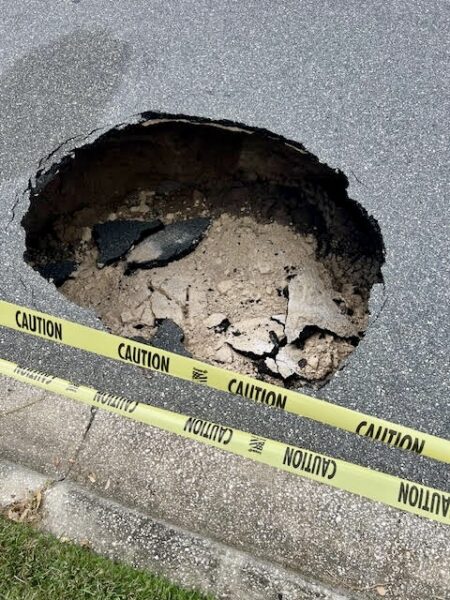 This hole has opened up in the roadway on Bradford Loop in The Village of Sanibel This hole has opened up in the roadway on Bradford Loop in The Village of Sanibel