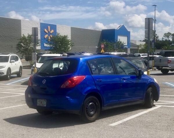 This little blue car was masquerading as a golf cart at Walmat This little blue car was masquerading as a golf cart at Walmat