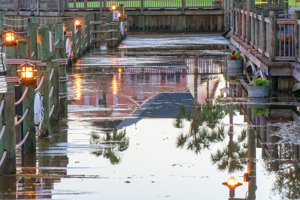 Reflections off the flooded boardwalk at Lake Sumter Landing
