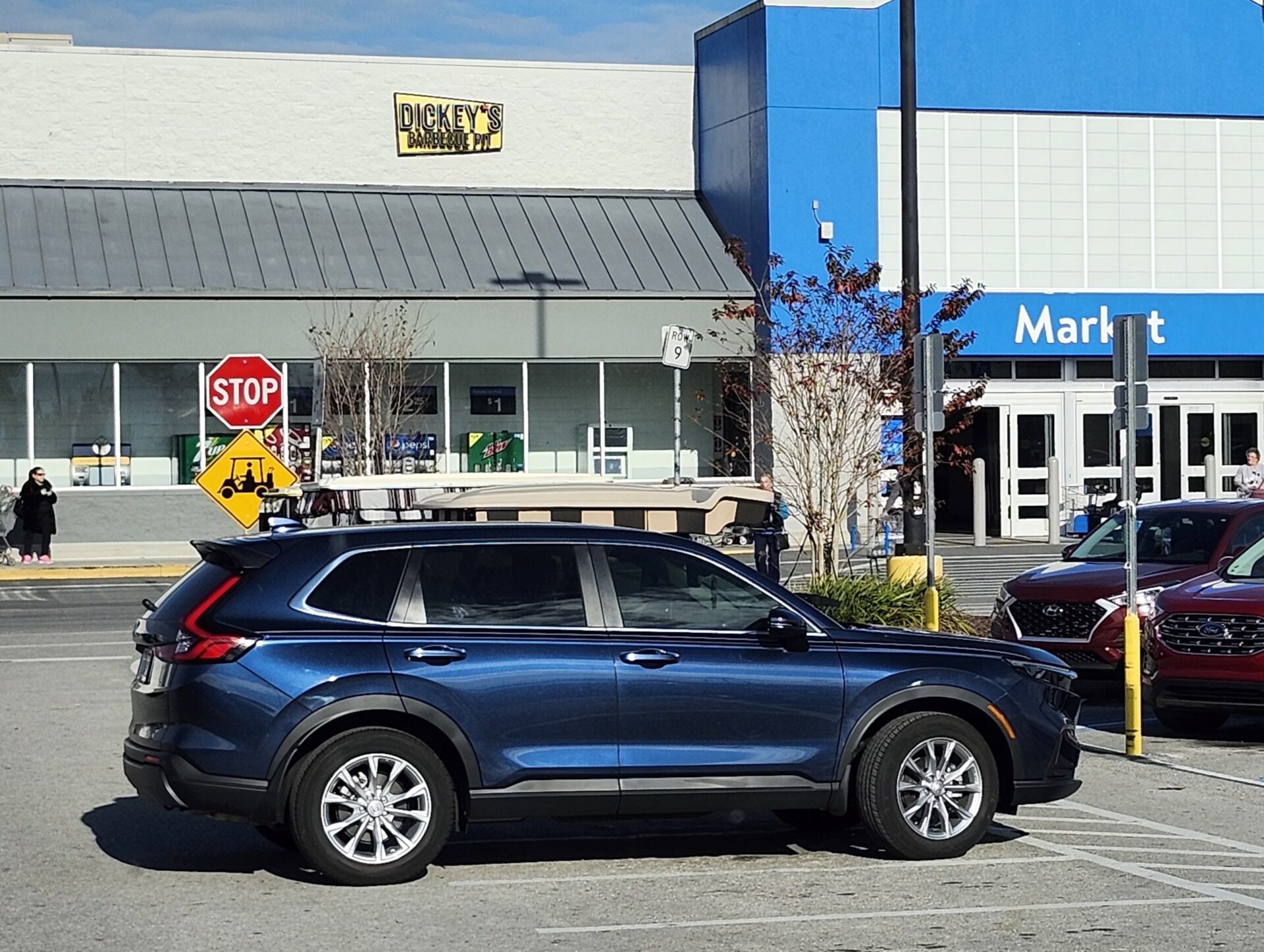 A non conforming motorist ended up in a golf cart parking spot at Walmart in Summerfield