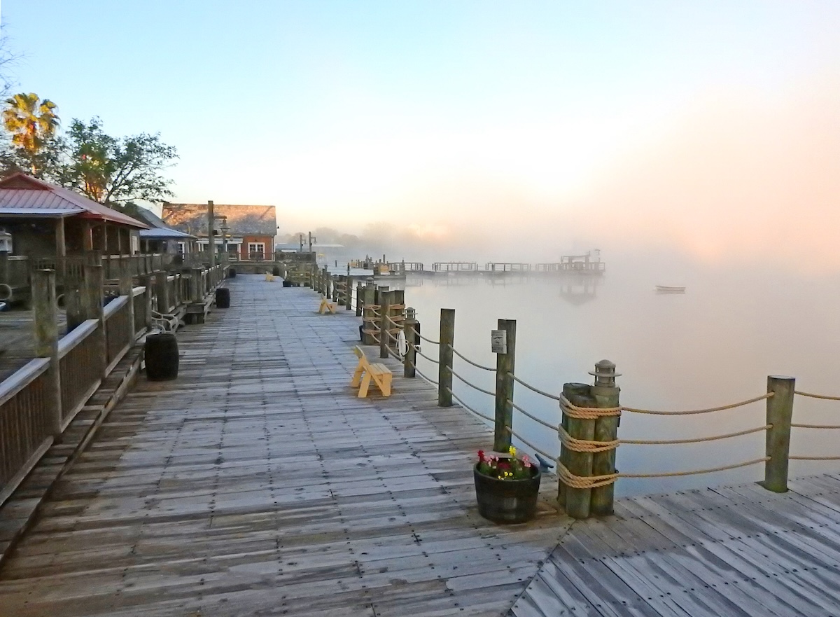Cold foggy morning on the boardwalk in Lake Sumter Landing